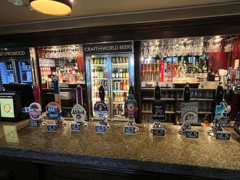 Spacious interior of The Earl Of Mercia Coventry with real ale pumps and Mercian-themed décor